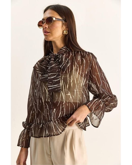 Bianco Lucci Brown Abstract Print Choker Collar Chiffon Blouse With Tie Detail