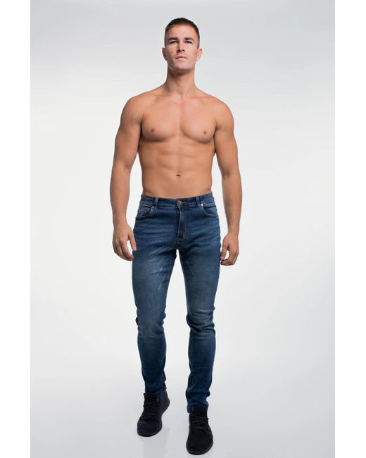 banan Ikke moderigtigt strømper BARBELL APPAREL Slim Athletic Fit Jeans in Blue for Men | Lyst