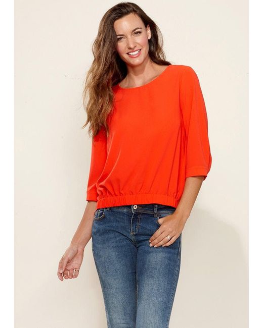 Pleione Gathered Hem Scoop Neck Blouse in Orange Lyst