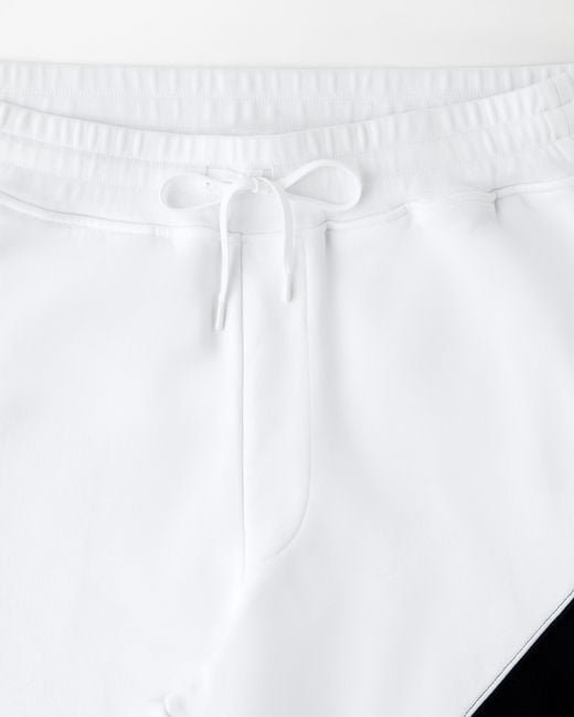 Versace Blue Embroidered Cotton Sweatpants for men