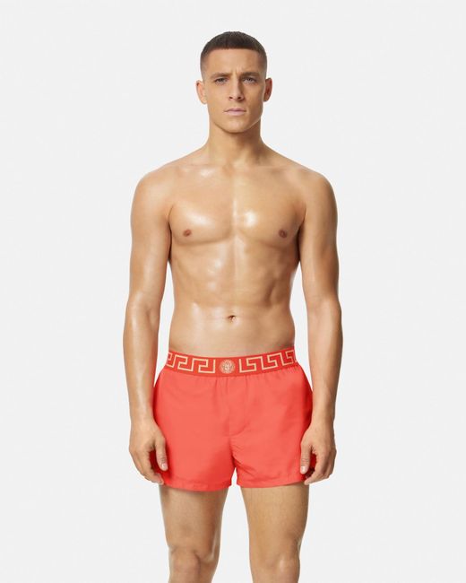 Versace Red Greca Border Swim Shorts for men