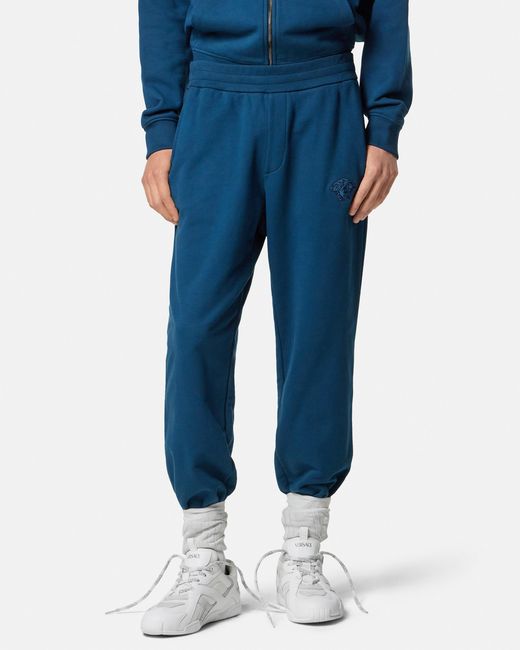 Versace Blue Embroidered Cotton-Jersey Sweatpants for men