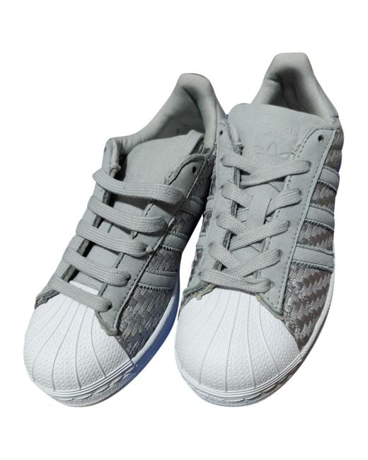 grey adidas superstar trainers