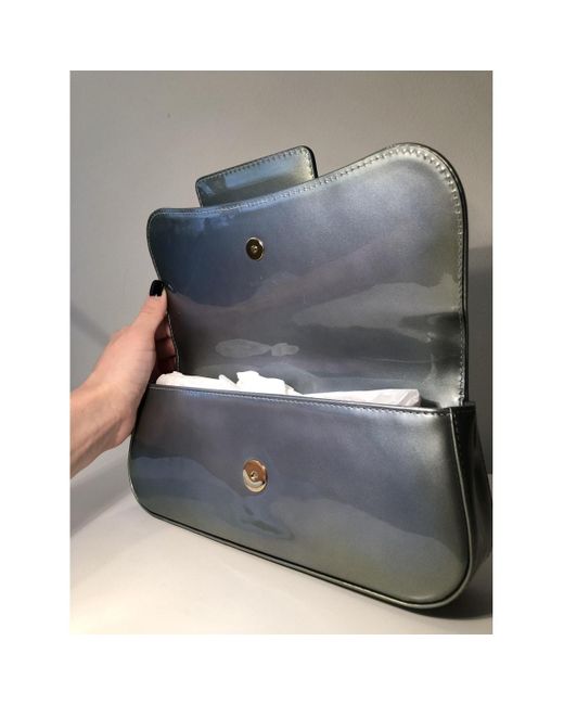 grey patent leather clutch bag