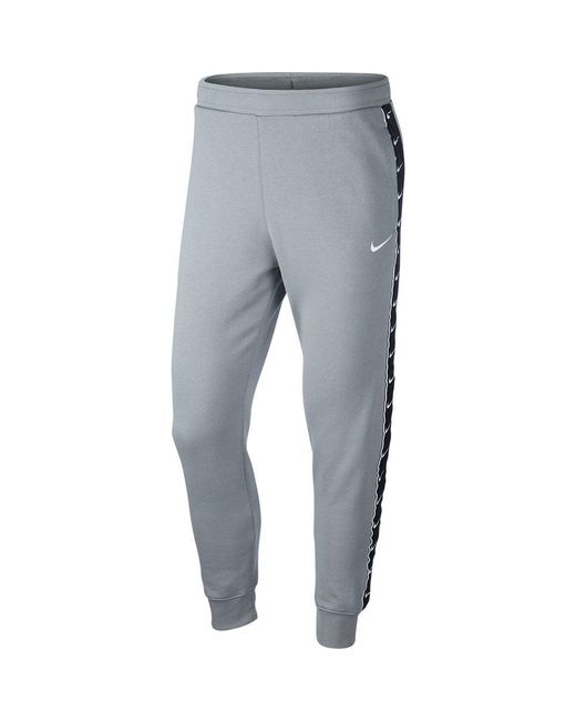 Nike Sportswear Swoosh Tape Fleece Pant Joggers in Grey for Men | Lyst UK