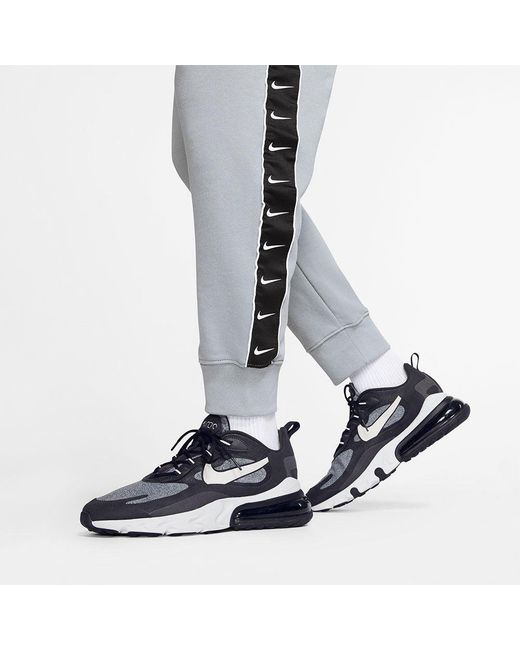Nike Sportswear Swoosh Tape Fleece Pant Joggers in Grey for Men | Lyst UK