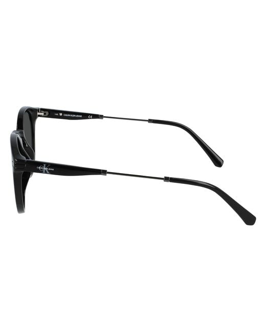 Calvin Klein Black Ckj20705S 001 Sunglasses Plastic Round Photochromatic Photochromatic