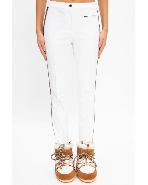 white ski trousers