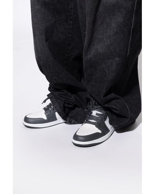 Nike White Sports Shoes "Air Jordan 1 Low" for men
