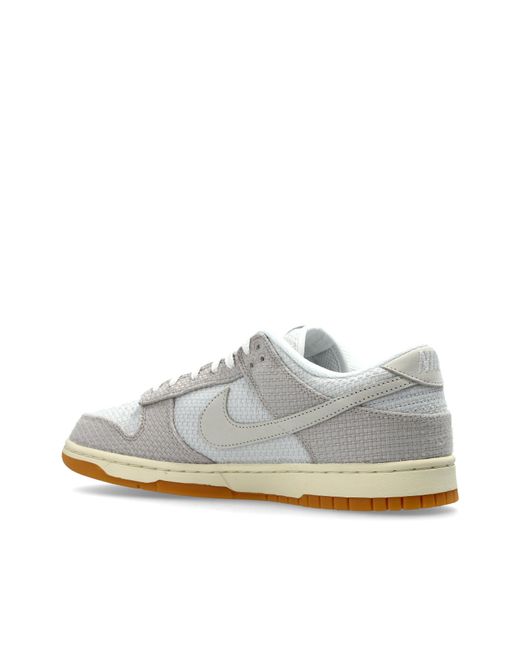 Nike White Sports Shoes "Dunk Low Retro" for men