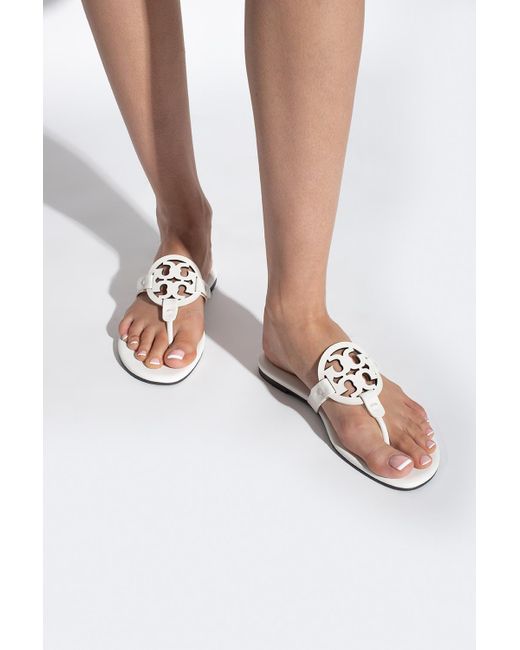 white tory burch slides