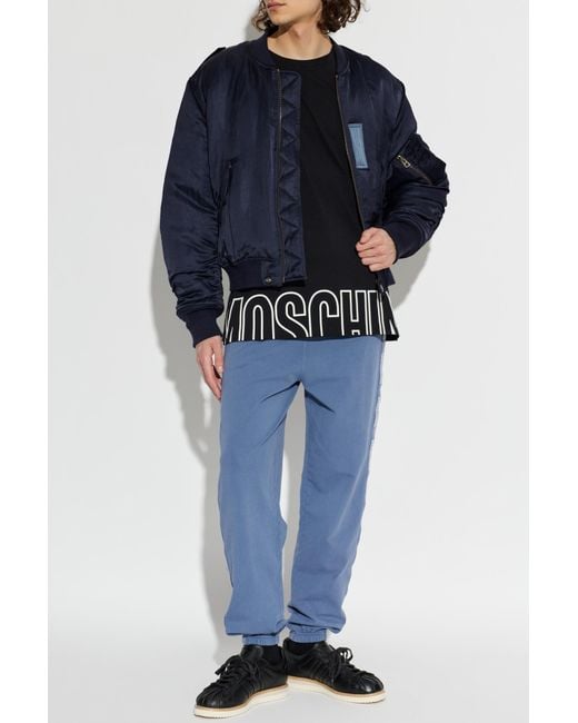 Moschino Blue Track Pants With Side Stripes for men