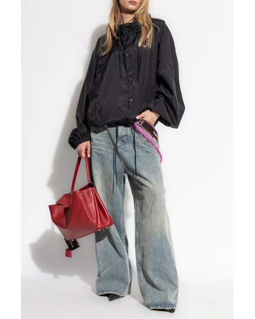 Balenciaga Blue Jeans With Decorative Appliqués