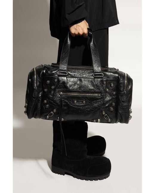 【関税&送料込】Balenciaga Black Leather Le Cagole Travel Ba Le Cagole leather duffel bag in black - Balenciaga | Mytheresa