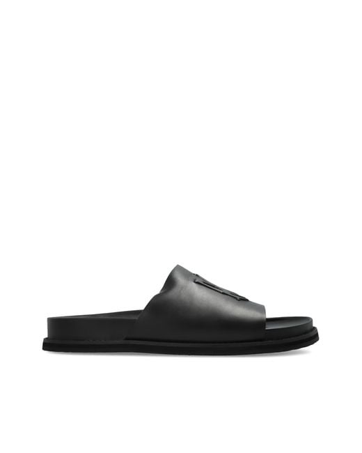 Amiri Black Leather Slides for men