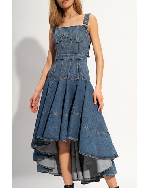 alexander mcqueen denim dress // Blue Ruffled VSP Consignment a cinched waist and flared skirt add a sense of whimsy to fashions most hardworking fabric. McQueen Denim Dress With Adjustable