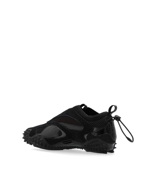 PUMA Sports Shoes Mostro Ac Aries Arise in Black for Men | Lyst