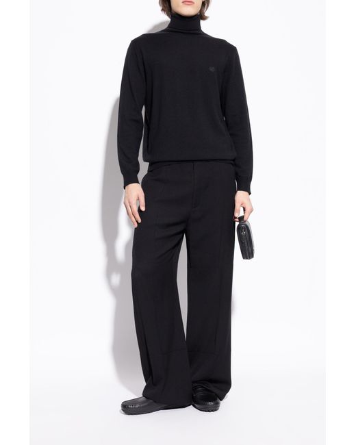 Tod's Black Leather Moccasins for men