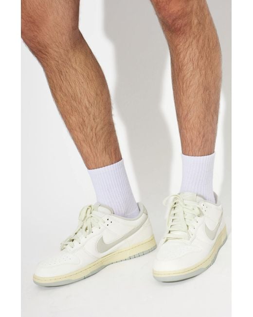 Nike White 'Dunk Low Retro' Sports Shoes for men