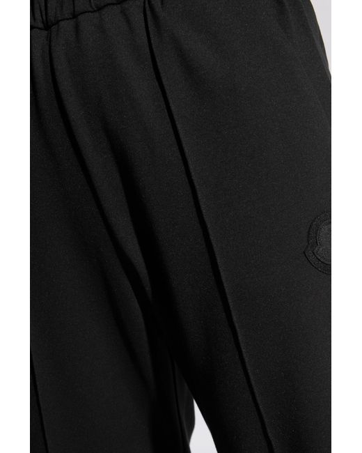 Moncler Black Trousers With Hem Slits,