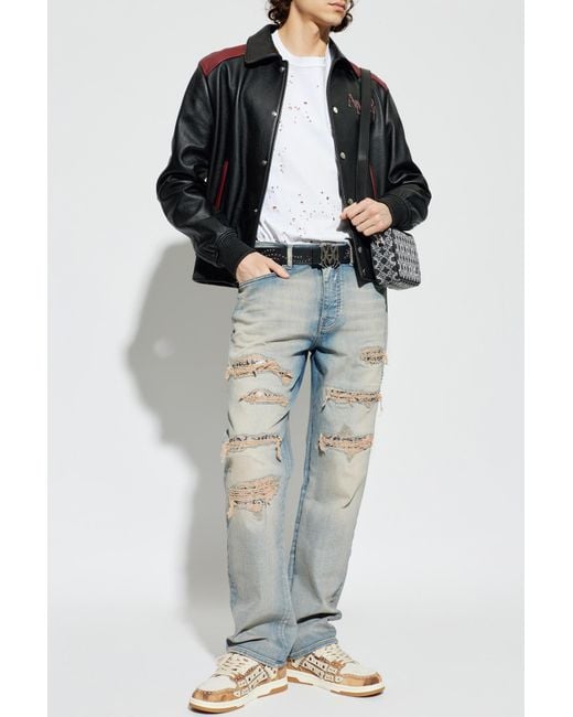 Amiri Blue Jeans With A Vintage Effect for men