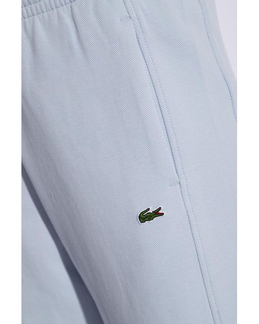 Lacoste Blue Trousers With Patch,