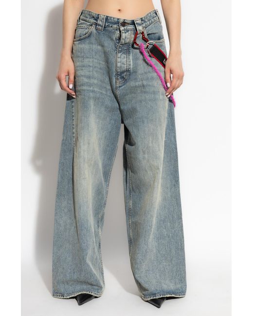 Balenciaga Blue Jeans With Decorative Appliqués