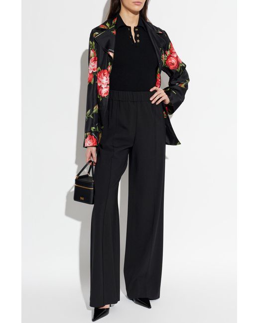 Dolce & Gabbana Black Ribbed Polo With Shimmering Buttons