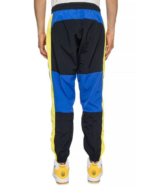 Nike Synthetic Logo Track Pants in Blue for Men - Lyst