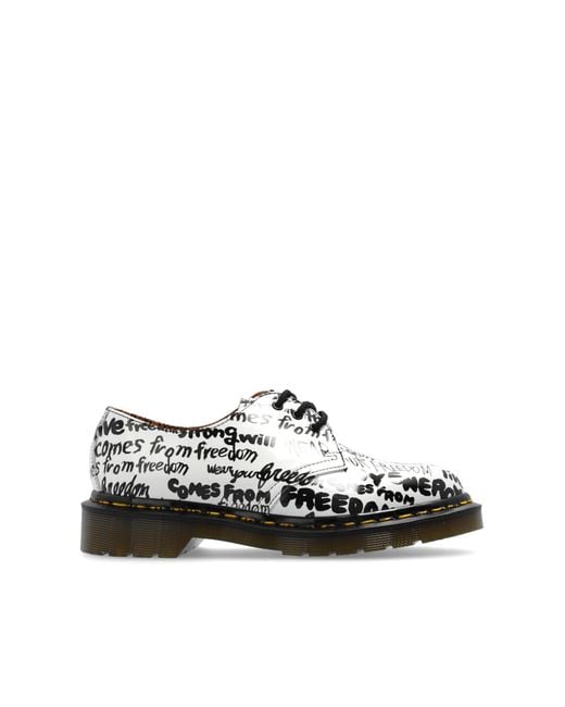 CDG by Comme des Garcons Comme Des Garcons X Dr. Martens in Black Lyst