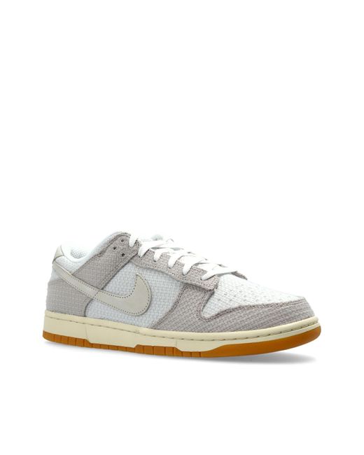 Nike White Sports Shoes "Dunk Low Retro" for men