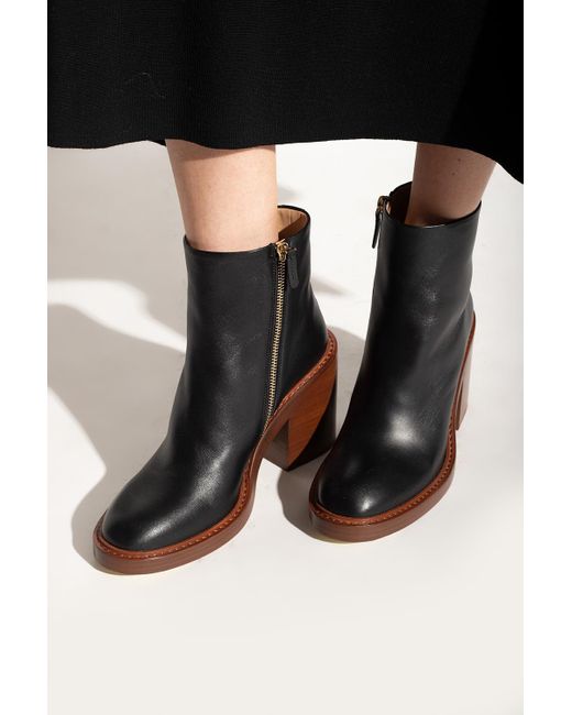 black leather booties with brown heel