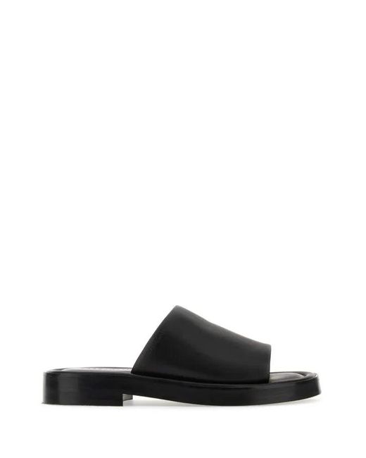 サンダル SALVATORE FERRAGAMO Black Nappa Leather Slippers Ferragamo Salvatore Nappa Leather Slippers in Black for Men