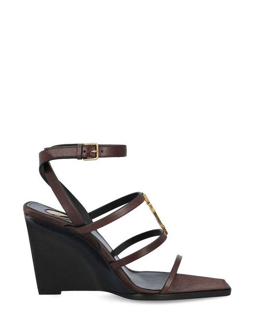 サンダル・ミュール Saint Laurent Black leather Cassandre wedges Saint Laurent - Cassandre leather wedges black - The Corner
