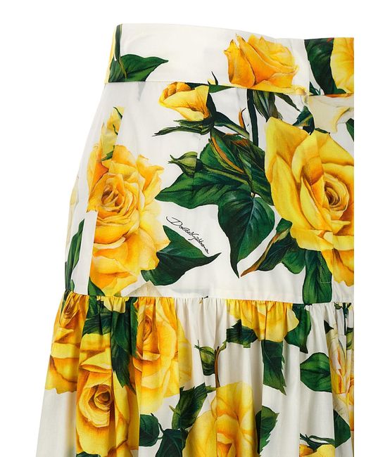 Gonna lunga a balze in cotone stampa rose gialle di Dolce & Gabbana in Yellow