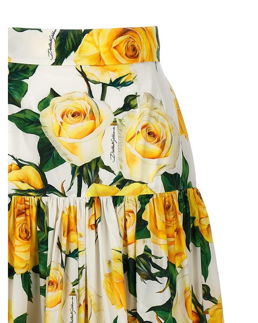 Gonna lunga a balze in cotone stampa rose gialle di Dolce & Gabbana in Yellow