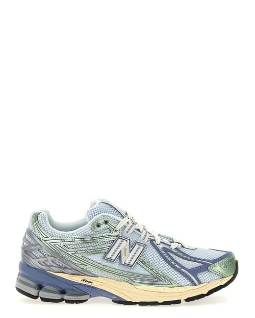 New Balance White Low Top Sneaker With Logo Patch On Tongue And Side And Perforated Panels