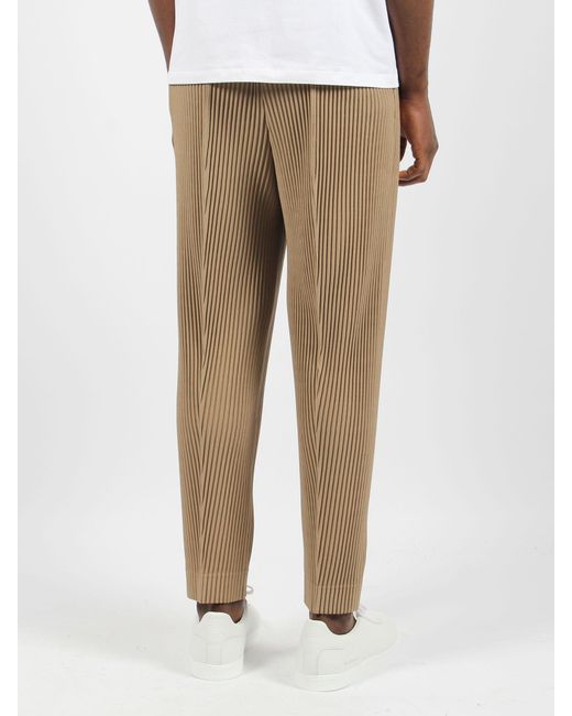 Compleat trousers di Homme Plissé Issey Miyake in Natural da Uomo