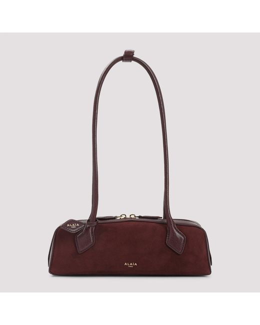 Garnet Suede Goat Leather Teckel Small Shoulder Bag-Donna di Alaïa in Purple
