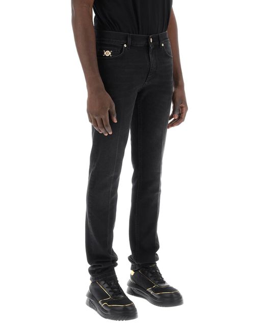 Jeans Slim Medusa Biggie di Versace in Black da Uomo