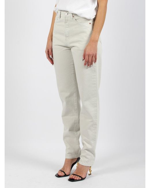 High-waisted slim-fit jeans di Saint Laurent in White