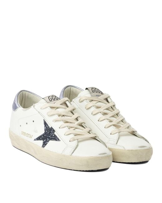 Super-Star Sneakers & Slip-On Bianco-Donna di Golden Goose Deluxe Brand in White