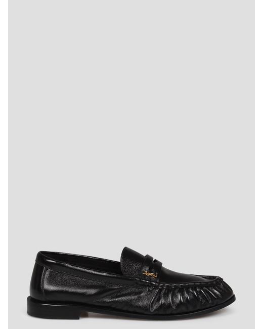 Le loafer penny slippers di Saint Laurent in White da Uomo