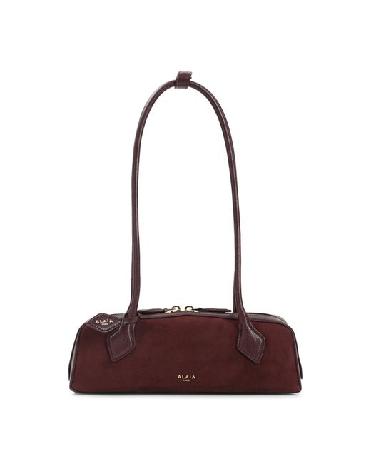 Garnet Suede Goat Leather Teckel Small Shoulder Bag-Donna di Alaïa in Purple