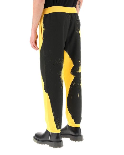Moschino Yellow Graphic Print Jogger Pants With Logo for men