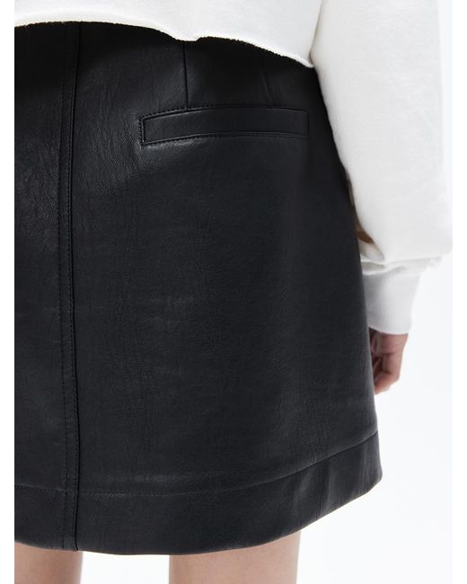 HAE BY HAEKIM Bold Button Mini Skirt in Black | Lyst