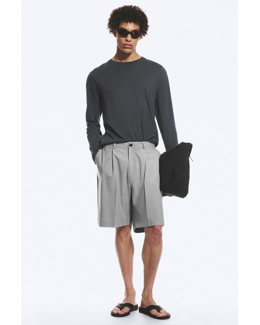 Weekday Black Uno Loose Suit Shorts for men