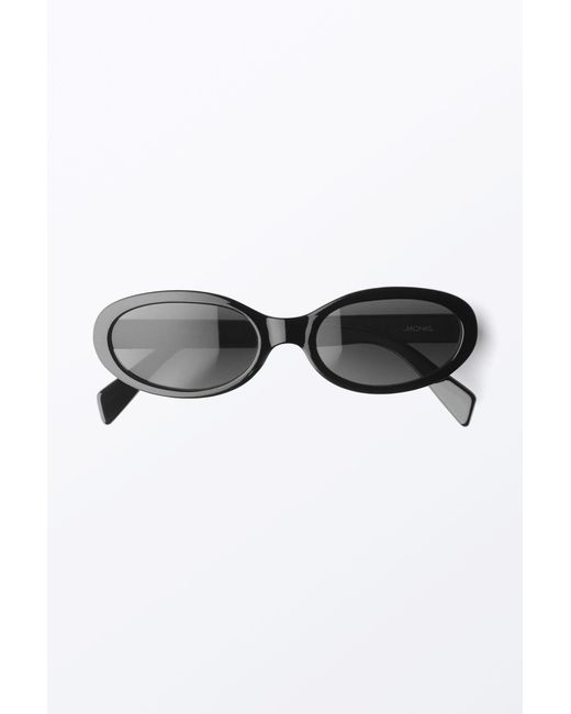 Monki Black Slim Oval Tinted Sunglasses