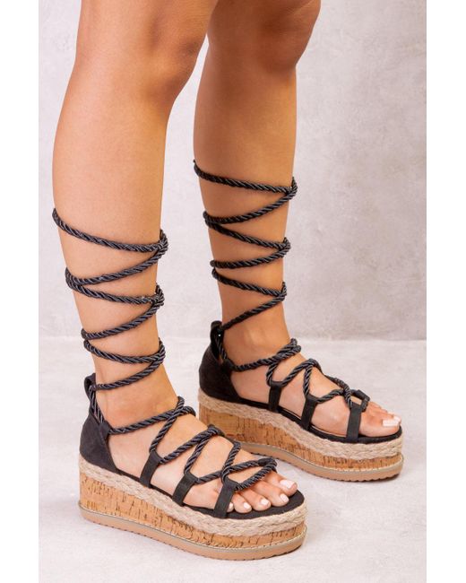 black tie up flatforms