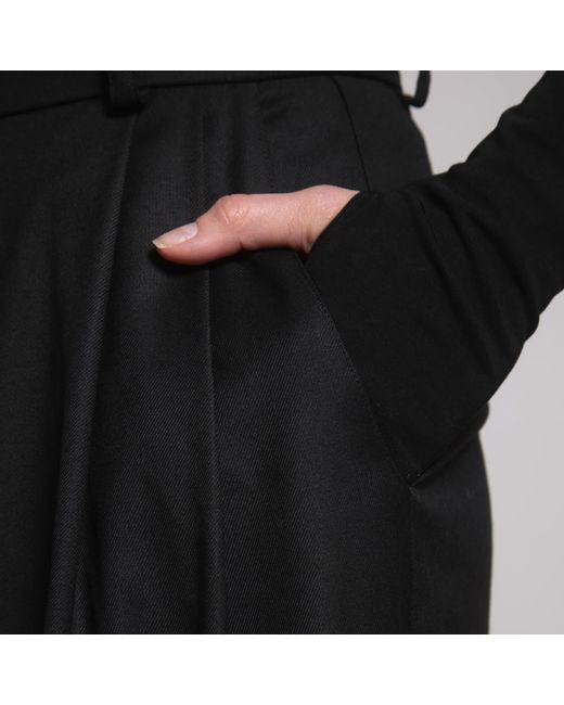 Una Berzina Black Turtleneck